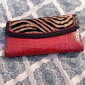 Brahmin wallet with fur or hair